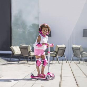 Patinete plegable Primo rosa con luces en las ruedas Globber